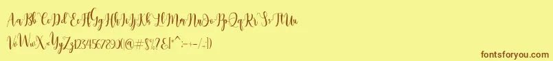 Dealove Script Demo Font – Brown Fonts on Yellow Background