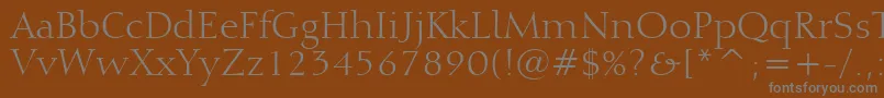 Weitere Informationen zur Calligraphic810Bt-Schriftart Calligraphic810Bt-Schriftart – Graue Schriften auf braunem Hintergrund