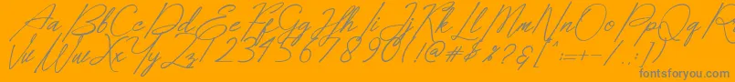 Dear Elisa-Schriftart – Graue Schriften auf orangefarbenem Hintergrund