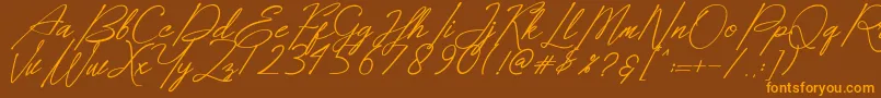 Dear Elisa Font – Orange Fonts on Brown Background