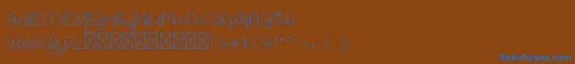 DearAudrey Script-Schriftart – Blaue Schriften auf braunem Hintergrund