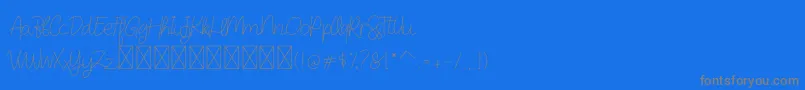 DearAudrey Script Font – Gray Fonts on Blue Background