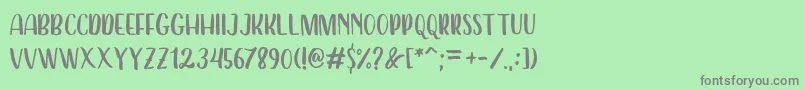 フォントDearday Sans – 緑の背景に灰色の文字