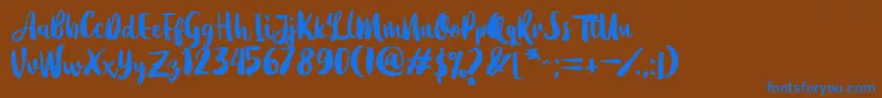 フォントDearday Script – 茶色の背景に青い文字