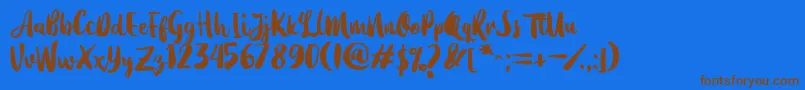 Fonte Dearday Script – fontes marrons em um fundo azul