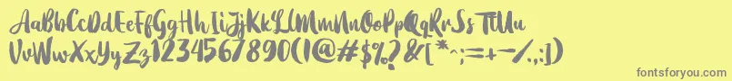 Dearday Script Font – Gray Fonts on Yellow Background