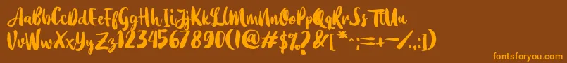 Dearday Script Font – Orange Fonts on Brown Background