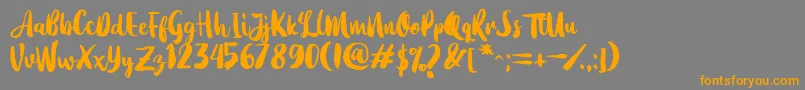 Dearday Script Font – Orange Fonts on Gray Background