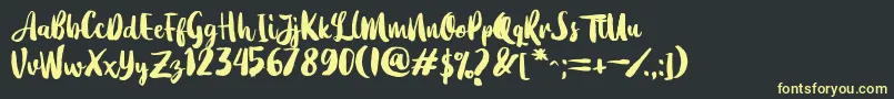 More about Dearday Script Font Dearday Script Font – Yellow Fonts on Black Background