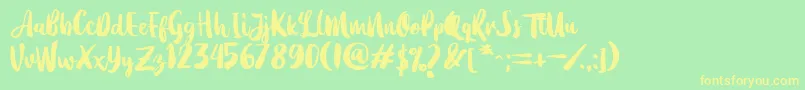 Dearday Script Font – Yellow Fonts on Green Background