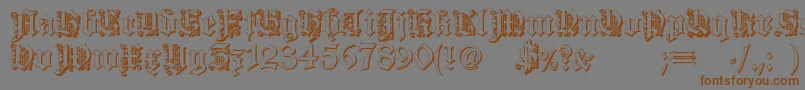 フォントDearest outline – 茶色の文字が灰色の背景にあります。