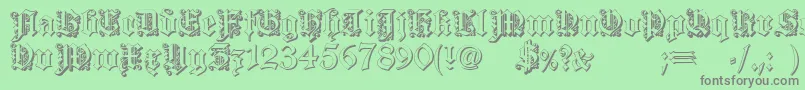 フォントDearest outline – 緑の背景に灰色の文字