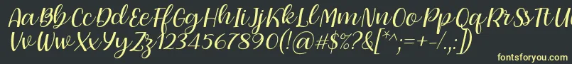 フォントDearly loved one by 7NTypes – 黒い背景に黄色の文字