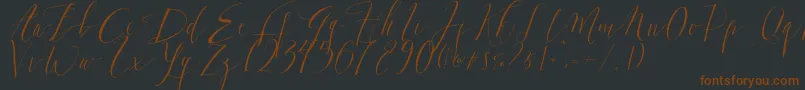 DearlyScript-Schriftart – Braune Schriften auf schwarzem Hintergrund