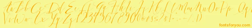 Шрифт DearlyScript – оранжевые шрифты на жёлтом фоне