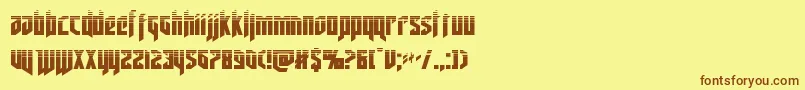 フォントdeathsheadhalf – 茶色の文字が黄色の背景にあります。