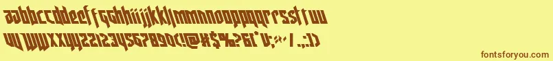 フォントdeathsheadleft – 茶色の文字が黄色の背景にあります。