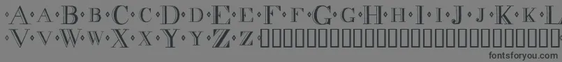 Decadence-Schriftart – Schwarze Schriften auf grauem Hintergrund