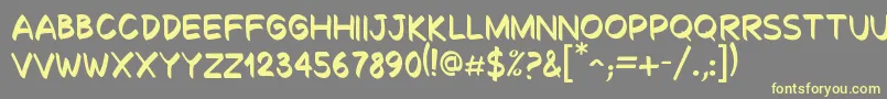 Decalk Font – Yellow Fonts on Gray Background