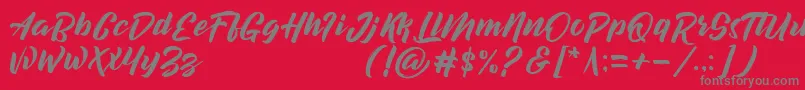 Fonte decalled script demo version – fontes cinzas em um fundo vermelho