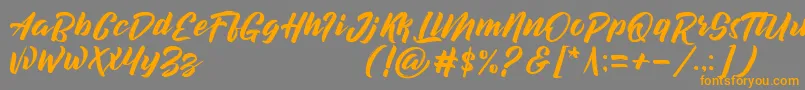 decalled script demo version-Schriftart – Orangefarbene Schriften auf grauem Hintergrund