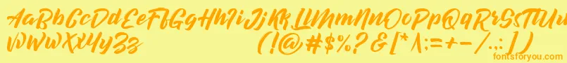 フォントdecalled script demo version – オレンジの文字が黄色の背景にあります。