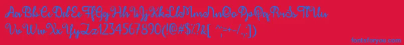 フォントDecember Calligraphy   – 赤い背景に青い文字