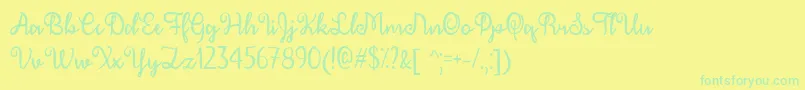 December Calligraphy   Font – Green Fonts on Yellow Background