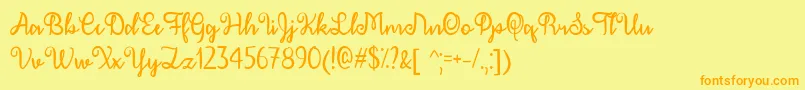 December Calligraphy   Font – Orange Fonts on Yellow Background