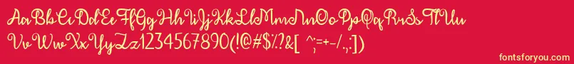 Fonte December Calligraphy   – fontes amarelas em um fundo vermelho