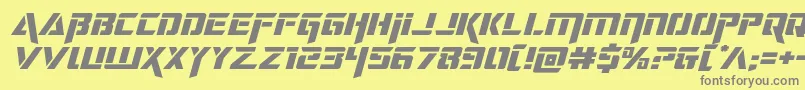 フォントdeceptibotsexpandital – 黄色の背景に灰色の文字