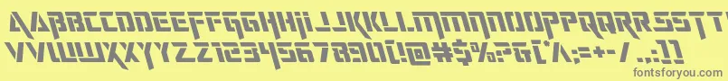 deceptibotsleft-fontti – harmaat kirjasimet keltaisella taustalla