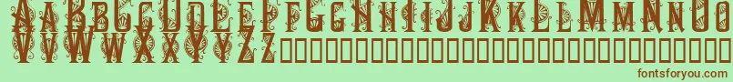 Decocaps Font – Brown Fonts on Green Background