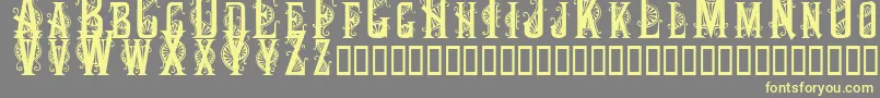 Decocaps Font – Yellow Fonts on Gray Background