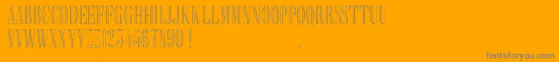 Delacorso Outlines D-Schriftart – Graue Schriften auf orangefarbenem Hintergrund