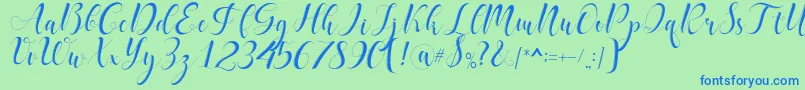 delaney Font – Blue Fonts on Green Background