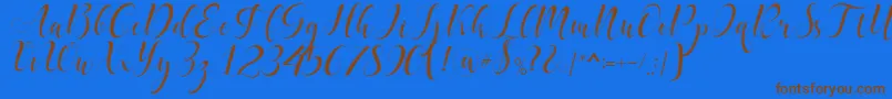 delaney Font – Brown Fonts on Blue Background