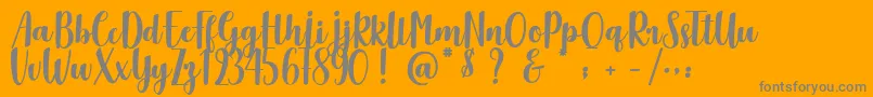 Delicious Adventures Font – Gray Fonts on Orange Background