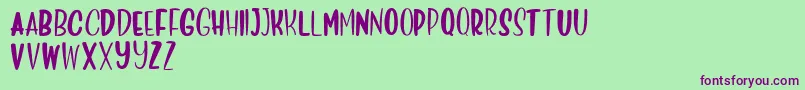 Deliciously Sans Font – Purple Fonts on Green Background