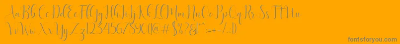 フォントDelight Script – オレンジの背景に灰色の文字