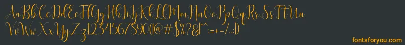 フォントDelight Script – 黒い背景にオレンジの文字