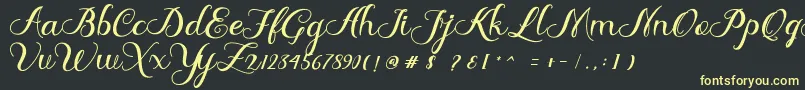 Delima Font – Yellow Fonts on Black Background