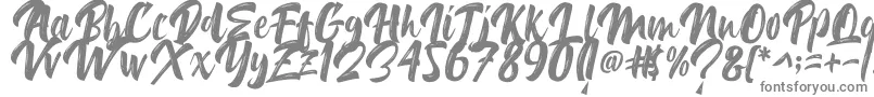 Delimax-fontti – harmaat kirjasimet valkoisella taustalla
