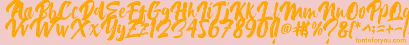 フォントDelimax – オレンジの文字がピンクの背景にあります。