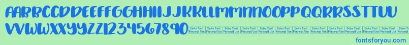 Delirious Demo Font – Blue Fonts on Green Background