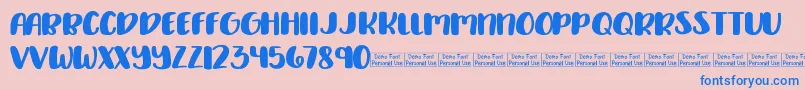 Delirious Demo Font – Blue Fonts on Pink Background