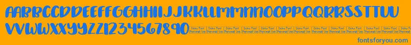 Delirious Demo-Schriftart – Blaue Schriften auf orangefarbenem Hintergrund