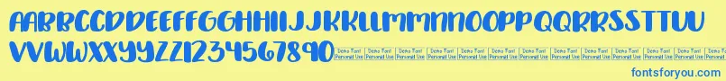 Delirious Demo-Schriftart – Blaue Schriften auf gelbem Hintergrund