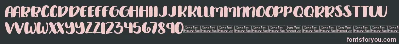 Delirious Demo Font – Pink Fonts on Black Background