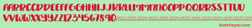 Delirious Demo Font – Red Fonts on Green Background